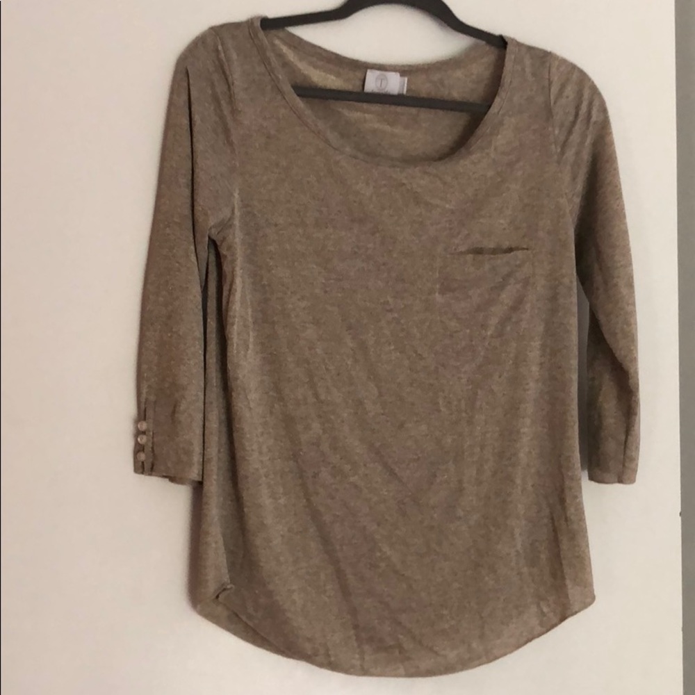 Understated sparkle pocket t w/button detail